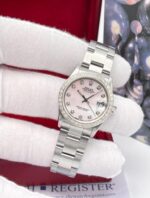 photo de Montre Rolex Datejust 31 mm pour femme, cadran en nacre rose, lunette en diamants