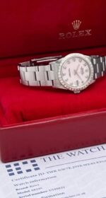 photo de Montre Rolex Datejust 31 mm pour femme, cadran en nacre rose, lunette en diamants